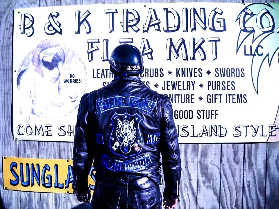 Blue Daos LEMC worldwide club colors on a leather jacket, embroidered by Independence Embroidery in Owensville, Missouri.