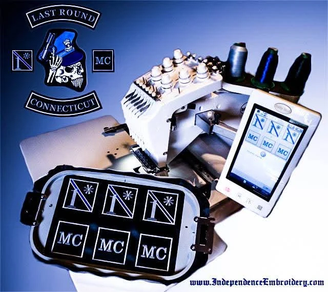 An embroidery machine running six cube patches for Last Round MC Connecticut, with the design file shown on the machine screen.