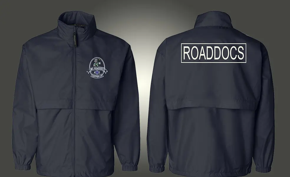 A navy jacket shown front and back, with an embroidered chest logo and lettering across the shoulders, made by Independence Embroidery in Owensville, Missouri.